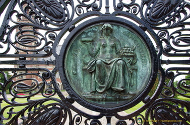 Medallions on Entrance gate showing Lady Justice